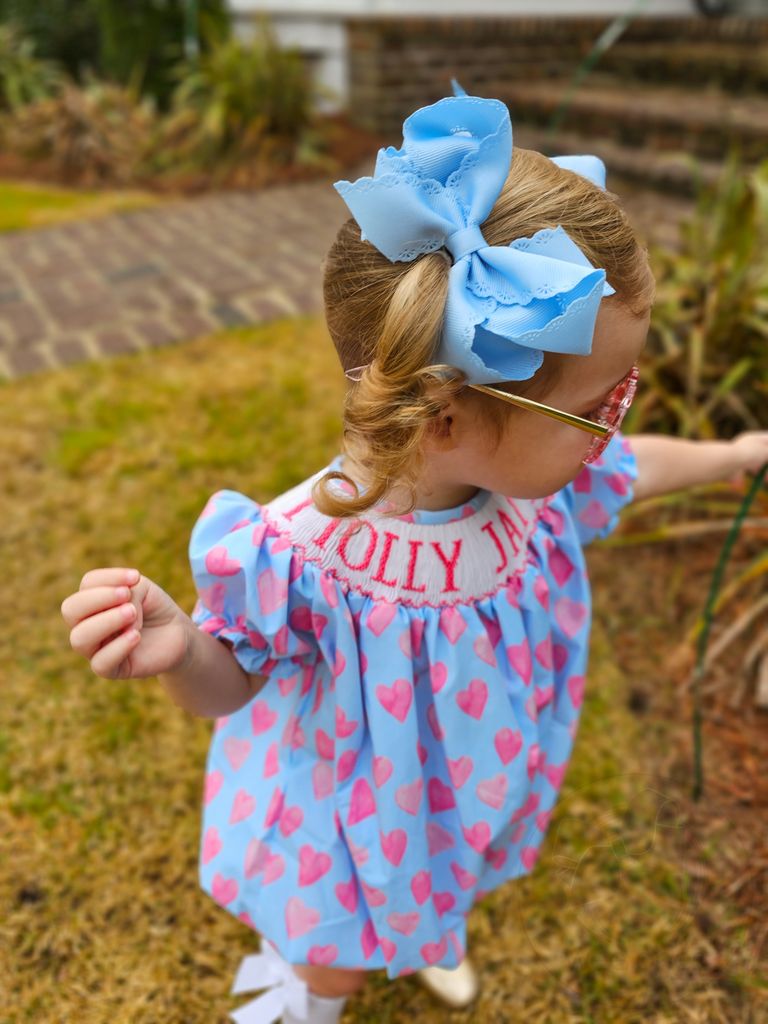 Medium Grosgrain Bow with Eyelet Flower-Embossed Edges
 