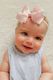 Small Grosgrain Hair Bow with Embossed Eyelet Edge on White Nylon Band
